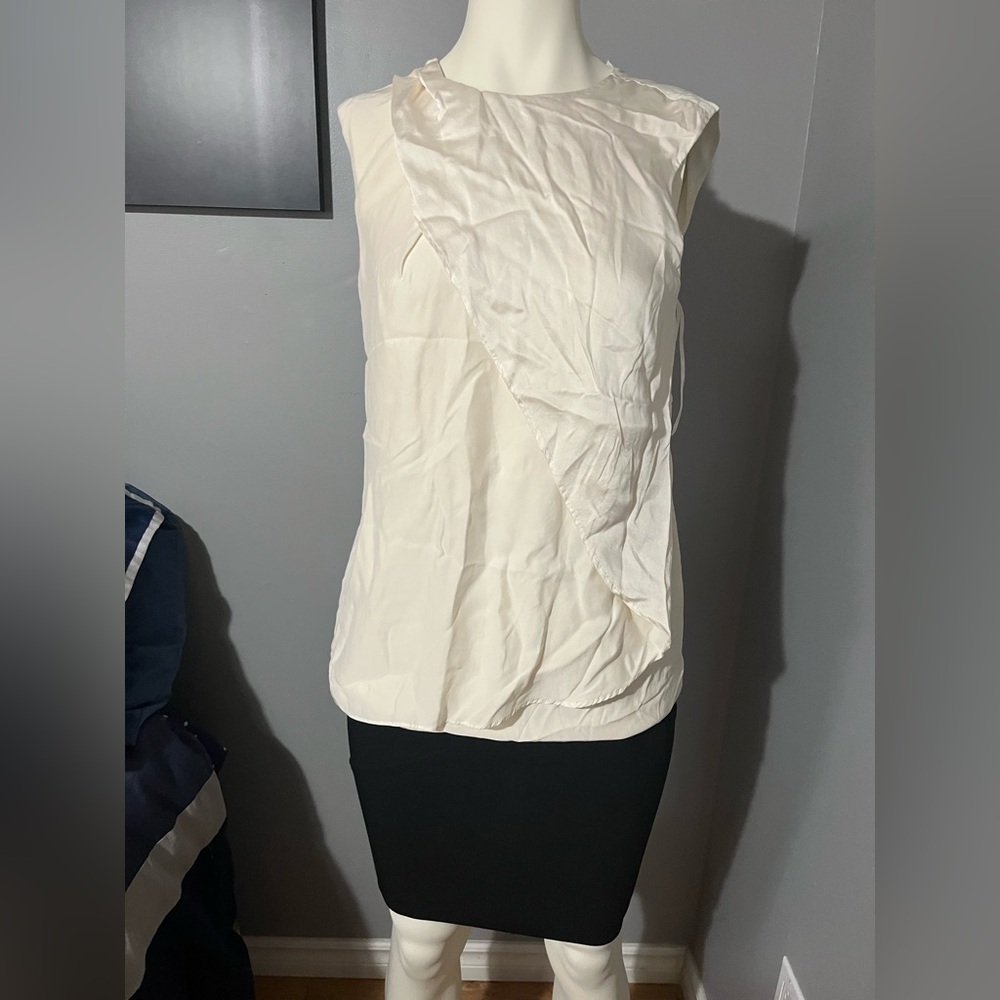Sleeveless Cream Ruffle-Accent Blouse